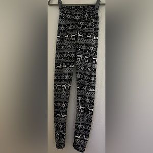 Black leggings with reindeer on them. Adults size small (can also fit kids)